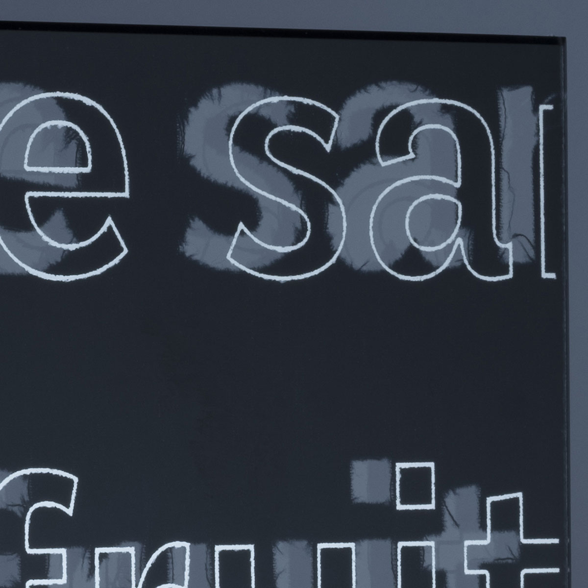 Black Perforated Text Mirror